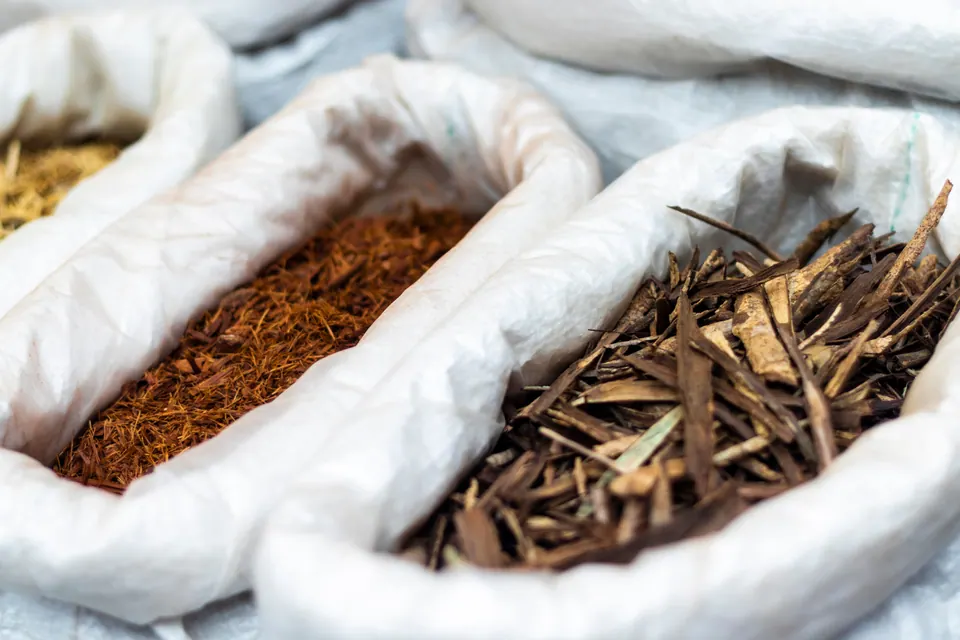 Sacks of ground aromatic wood and spice